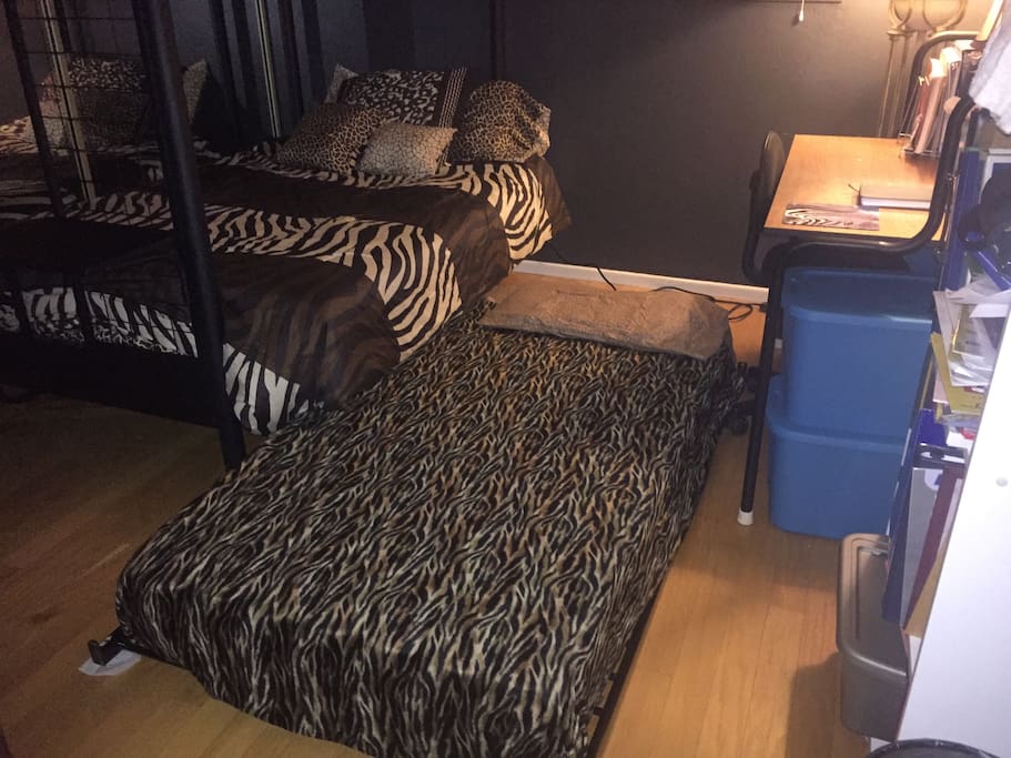 Option #3 set-up: Third bed (pop up trundle bed) with comfy new mattress . Raises to the hight of a normal bed. Stores easily under futon bed.