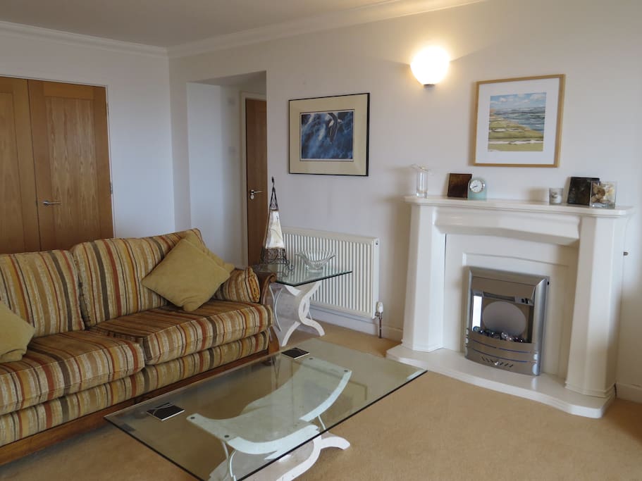 Large, comfortable lounge with views out to sea.