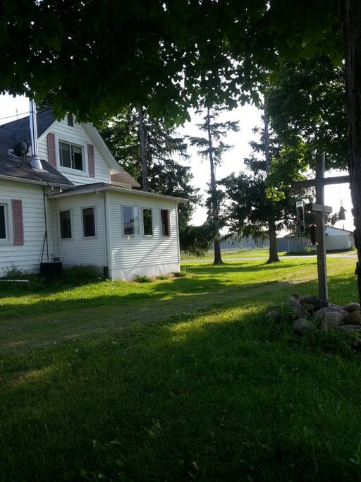 1891 farmhouse with an enclosed side porch