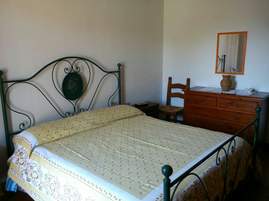 Large double room with double bed king side and wardrobe.