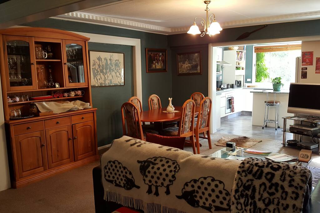 The dining/kitchen/ lounge area