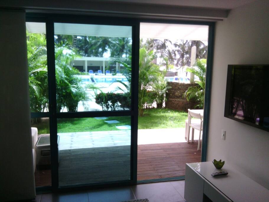 Terraza con Barbecue y Jardin con la Mejor vista y acceso a la piscina Infinita y Playa. Barbecue and garden terrace with the best view and access to the infinity pool and beach