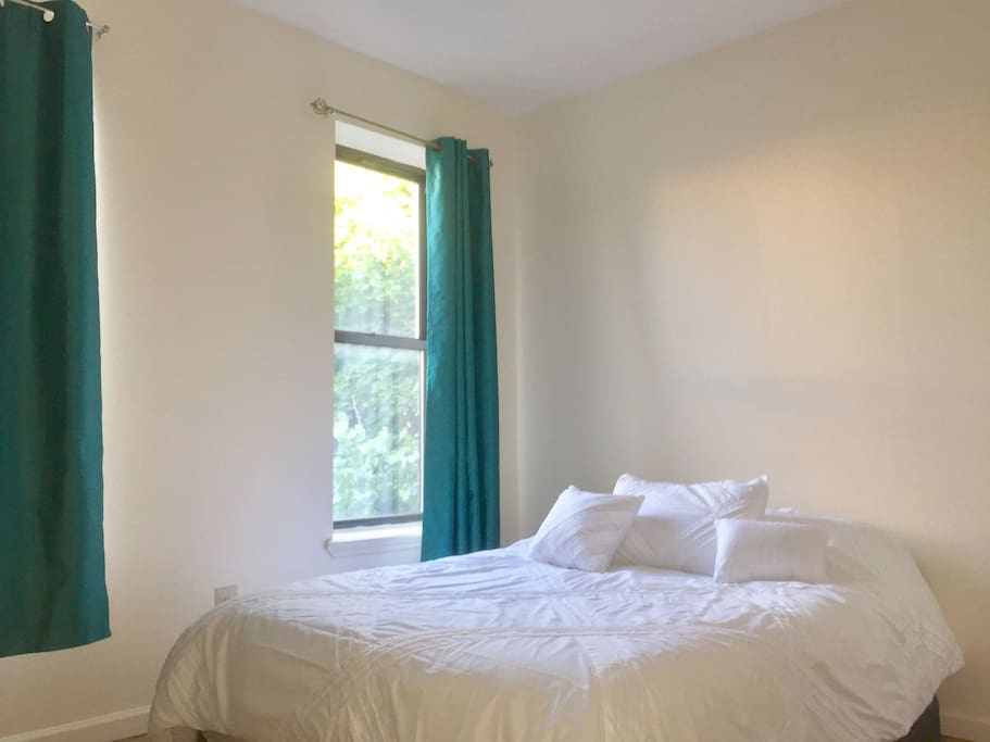 Brand new bedding, 2 large windows with all day light, black out curtains, oscillating fan, full closet, hangars, shelf space for storage and minimal distraction for a peaceful nights rest.