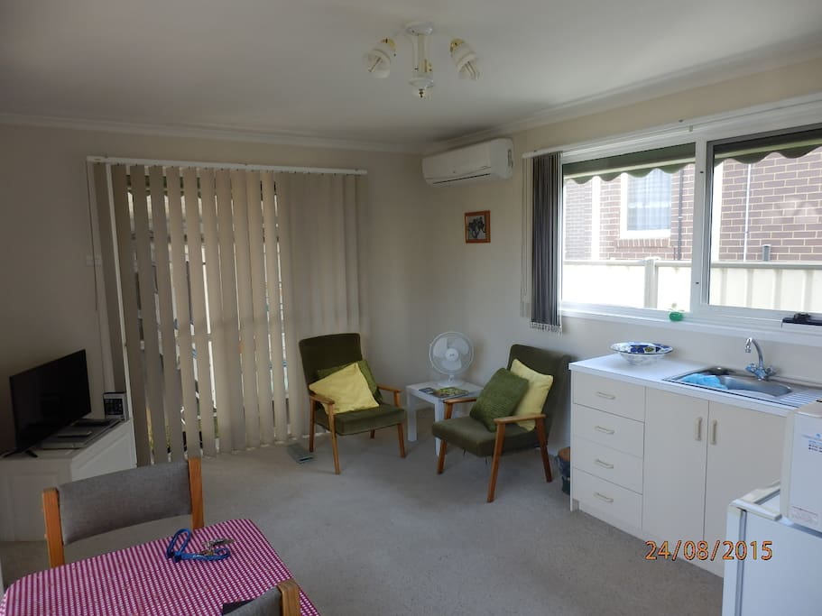 Lounge /Dinning area with TV Reverse Cycle Air Con