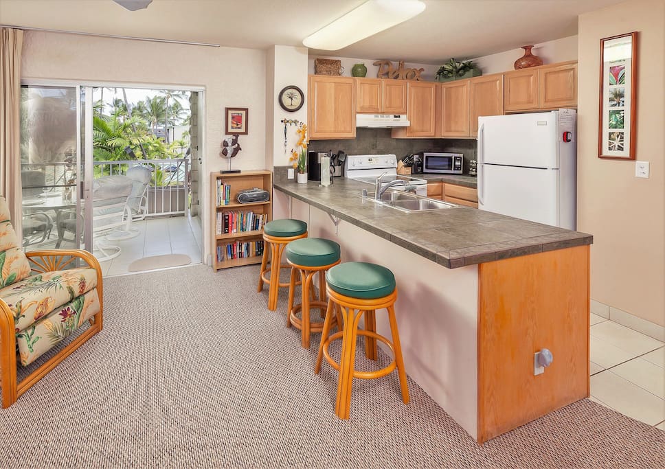 Open and spacious living area and the lanai just beyond