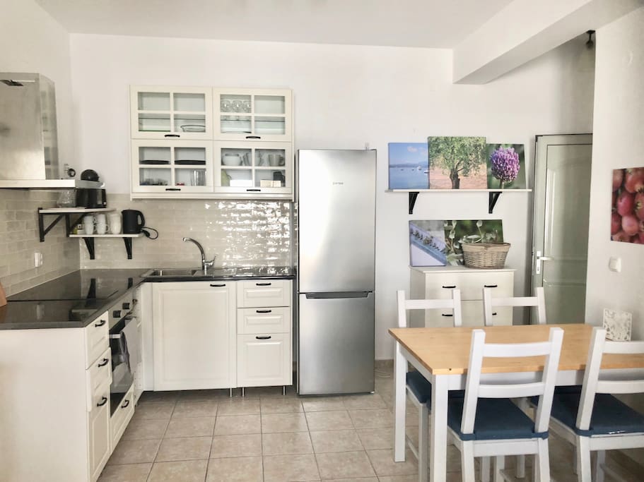 Fully Equipped Kitchen with coffee machine and utensils for cooking