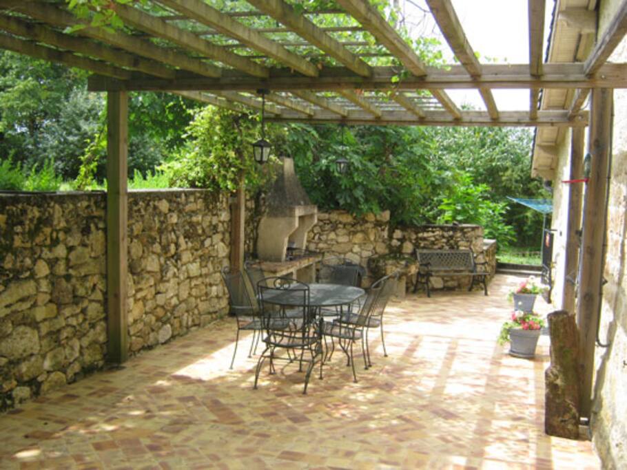 Enclosed terrace with barbecue