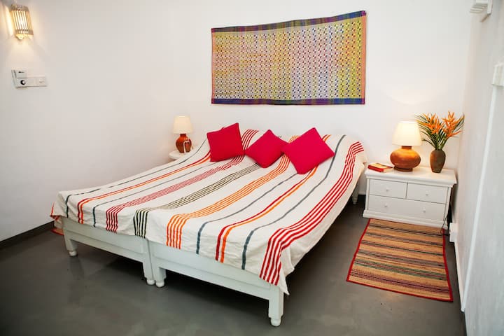 Double bedroom no.1 with mosquito net.