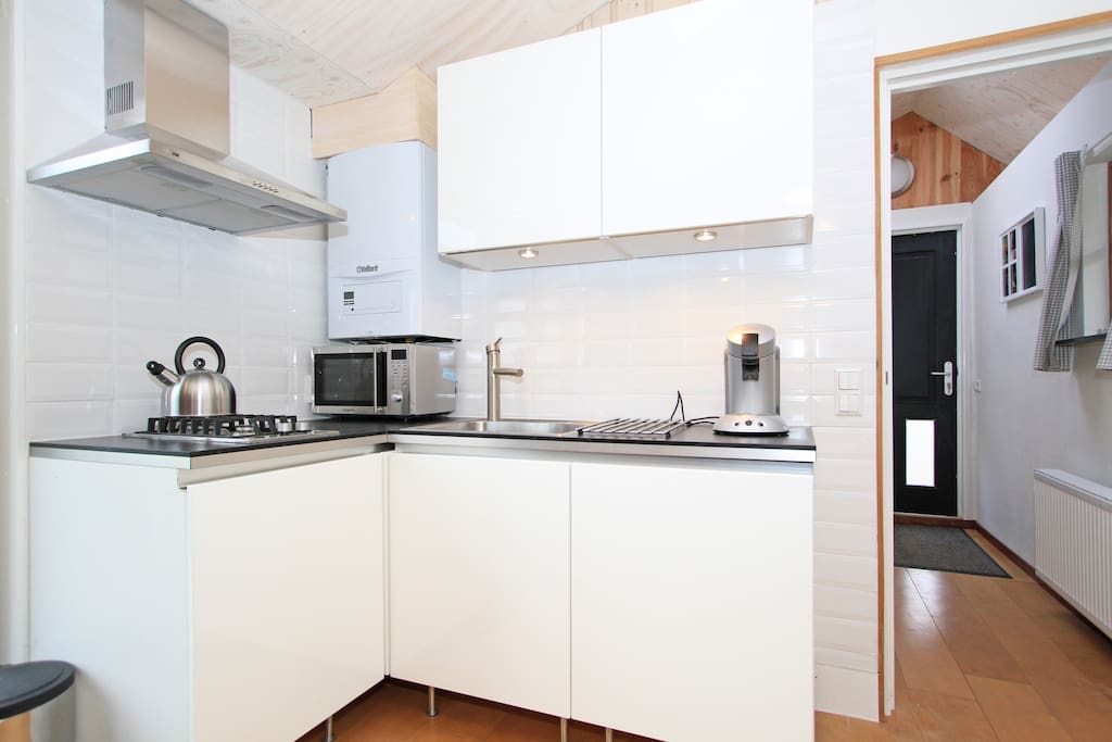 our bright and shiny kitchen with combi microwave, senseo coffee machine, toaster and fully equipped