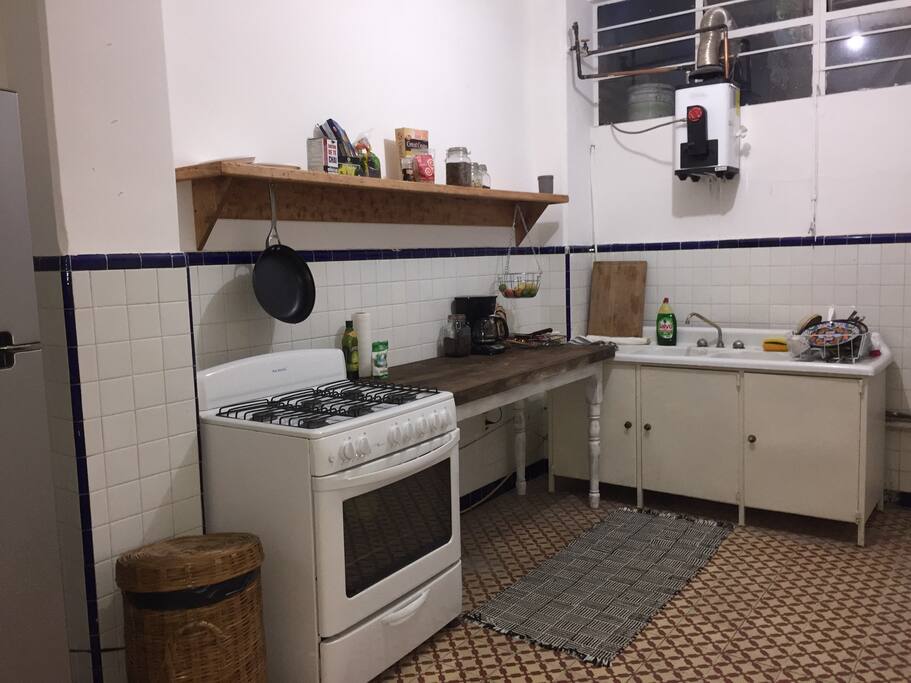 Cool kitchen with fridge, stove, sink and spices!