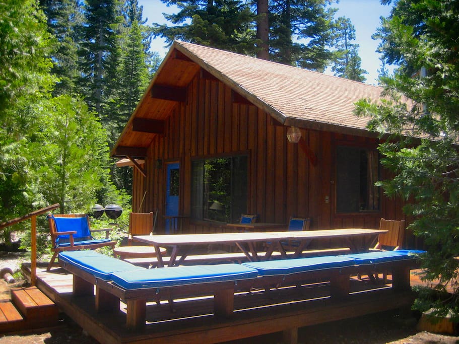 MAIN cabin with spacious deck and picnic tables to seat up to 24 people