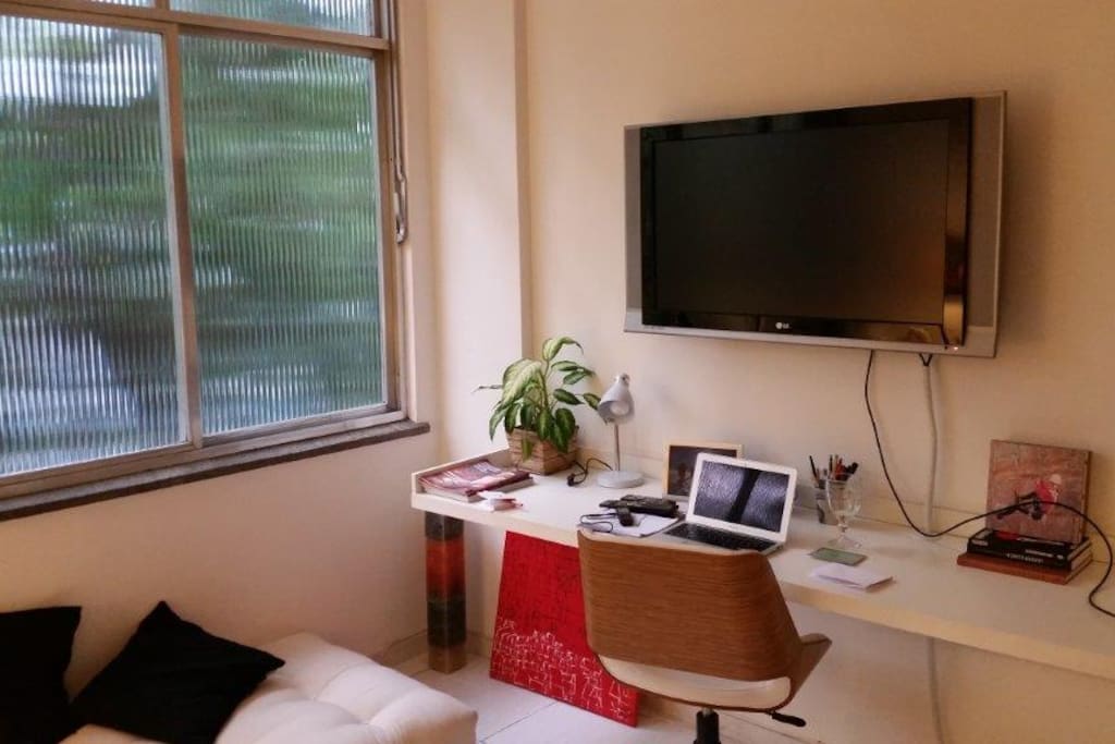 A futon that can serve as a bed for 1 person.