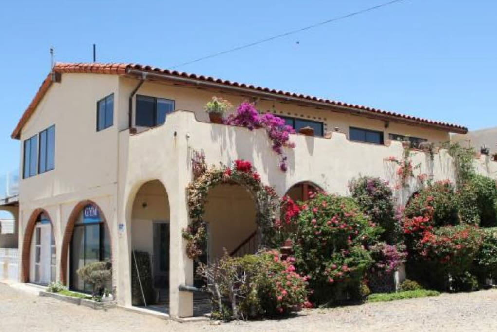 Front View of home. Gym and Library on the ground floor.