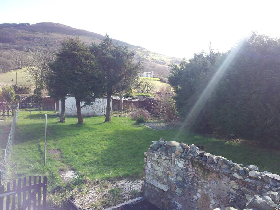 There are beautiful views from the front and the back of the house of the mountains and also over towards Anglesey.