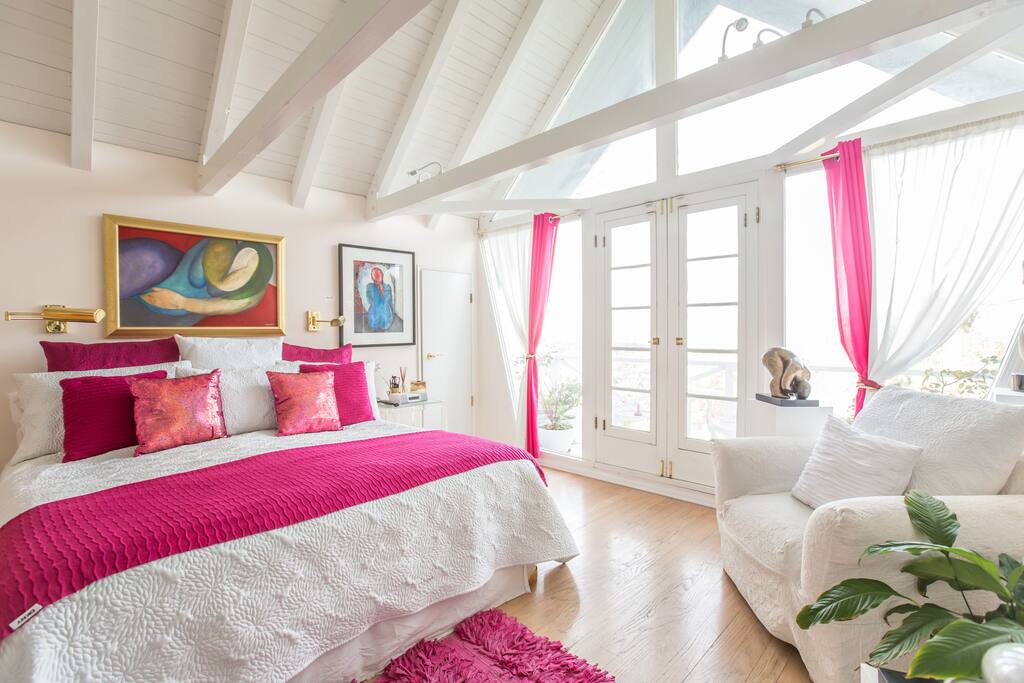 Master upstairs suite with french doors leading to a balcony with valley views.