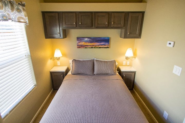 Master room with queen bed. There is a large closet and drawer space available in this room.