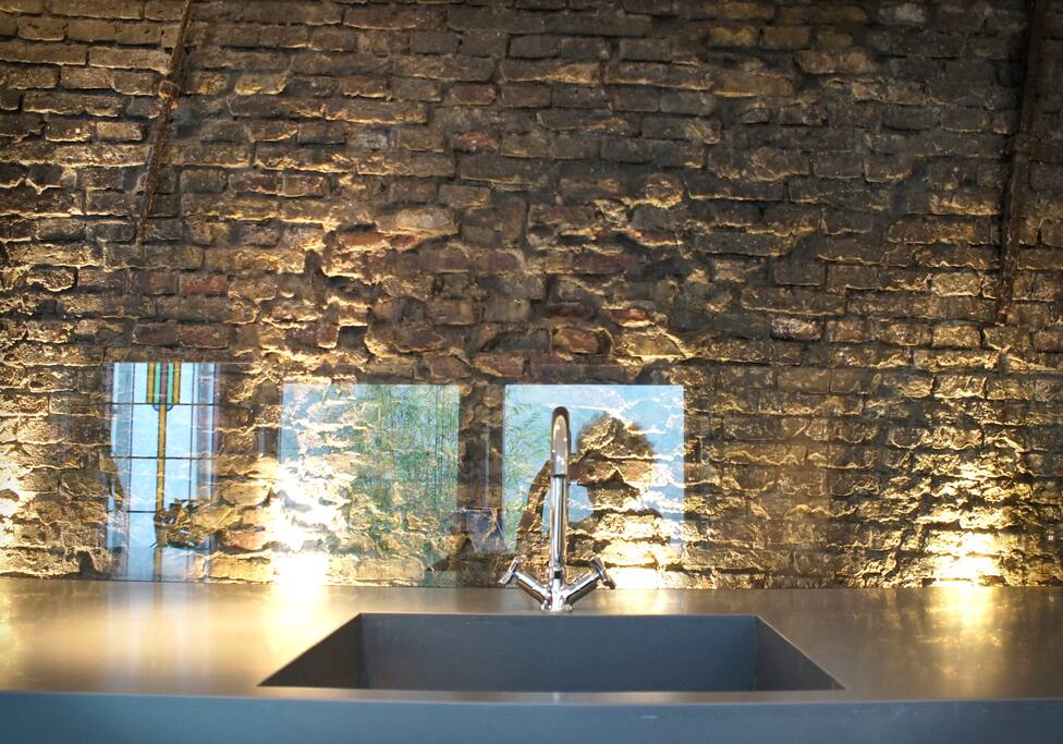 The kitchen in the back of the house, is facing our tiny patio, just as the bathroom downstairs