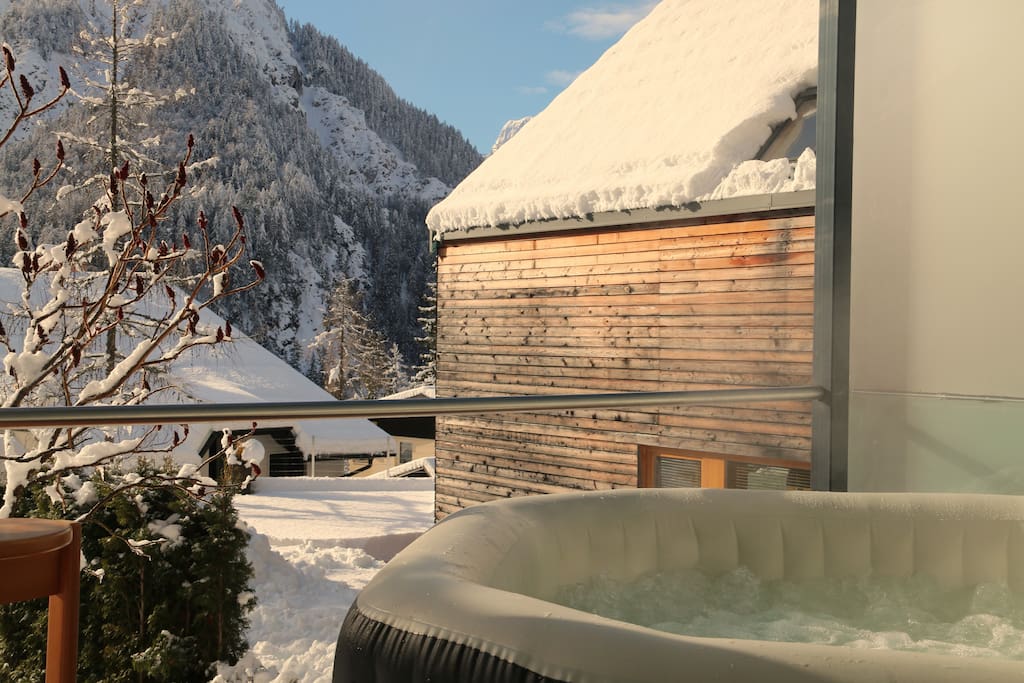 Sit in the hot tub and look at the mountains.