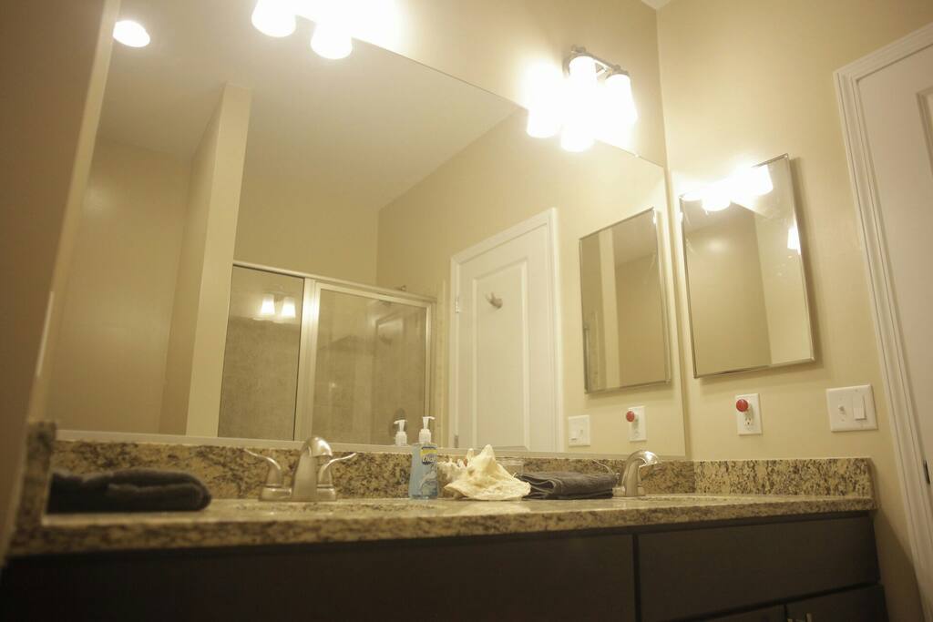 Two sinks, warm shower.
