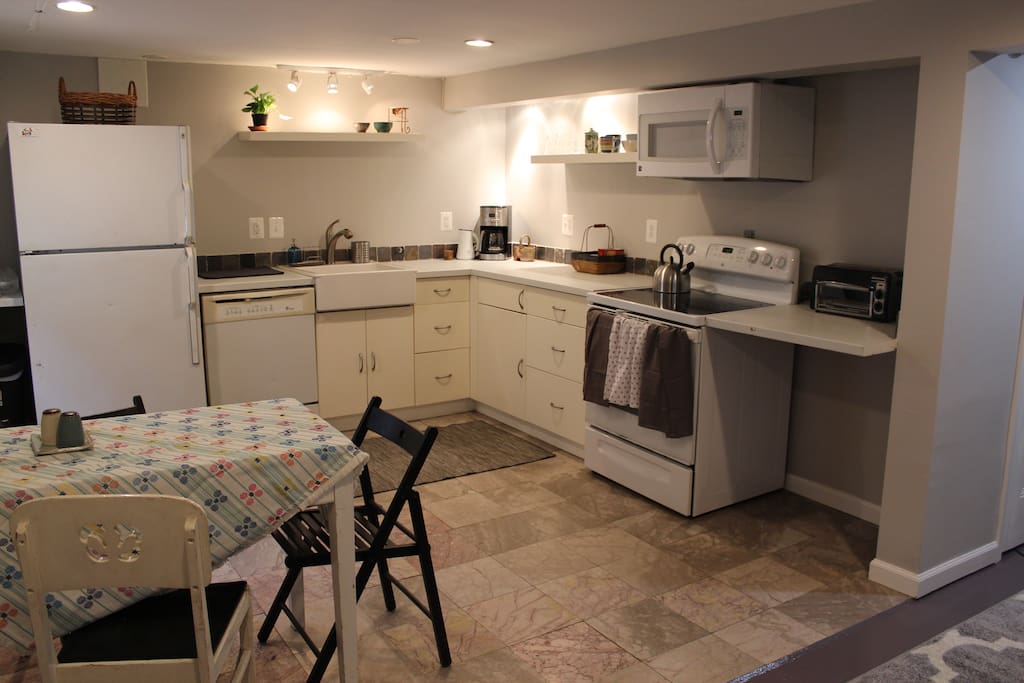 Large kitchen w/ full sized stove, coffeepot, toaster, microwave