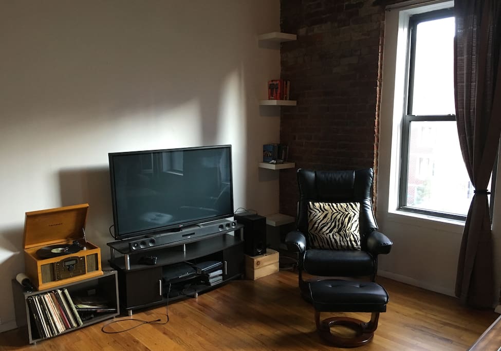 Media center complete with flat screen TV, PS3 and vintage record player w/ a wide selection of records to choose from. Help yourself to DVDs, Netflix and various games.