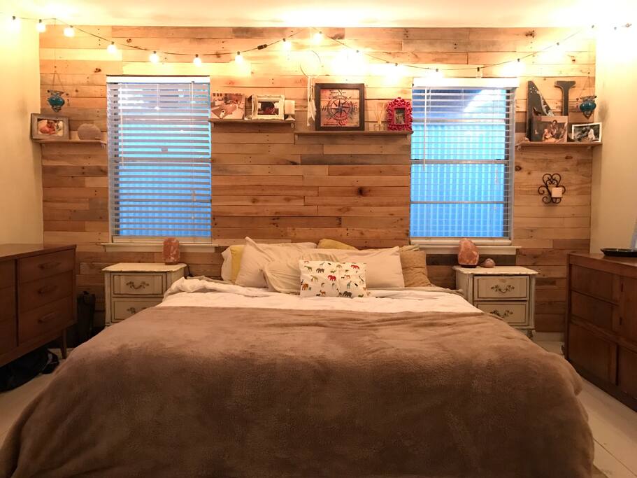 Cozy master bedroom with king size bed and Anthropology feel.