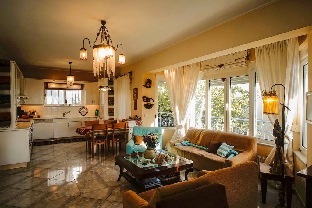 Another view of living room and the kitchen