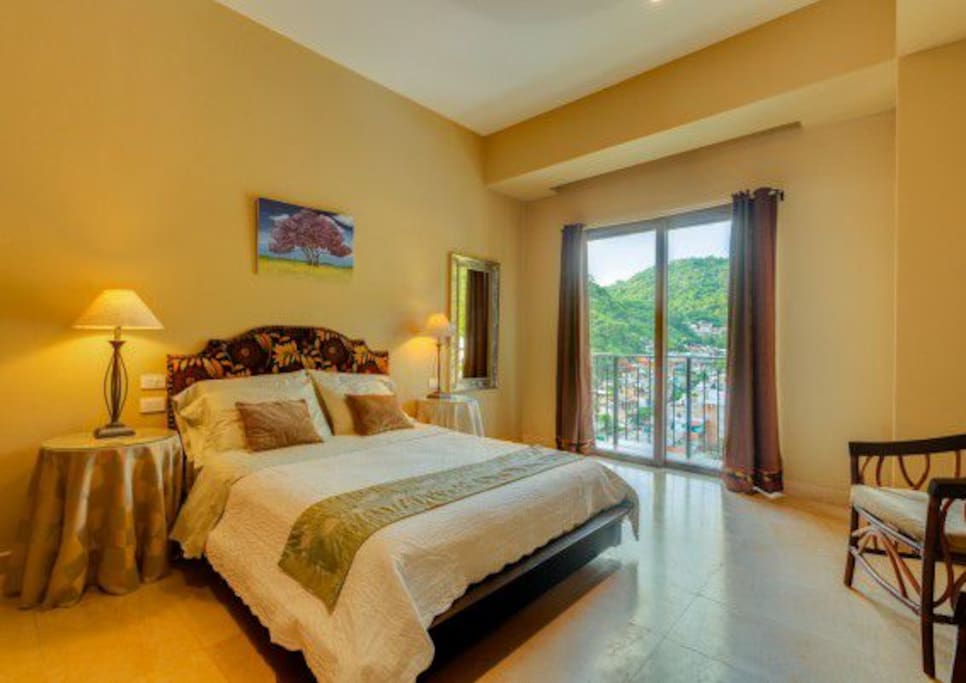 Air conditioned private bedroom with Juliet terrace and beautiful city and mountain view.