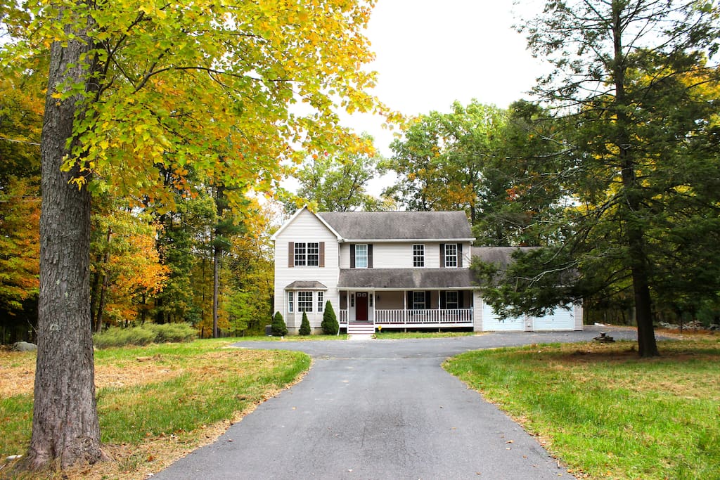 Front of the property, long tree lined driveway