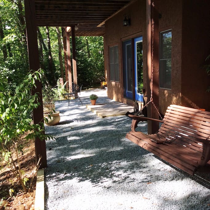 Patio to the private guest entrance (with porch swing)