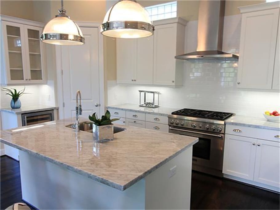 Kitchen Island with Thermador gas oven and stove