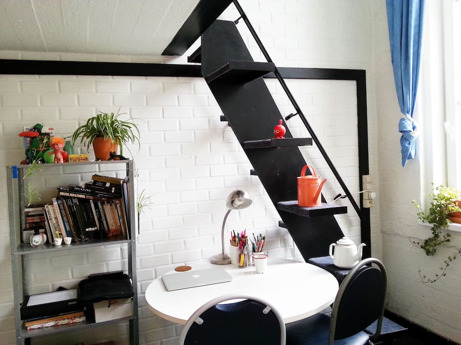 The table and stairs.