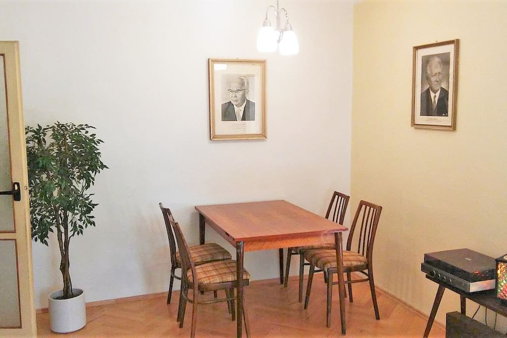 Table setting in the living room with communist leaders Husak and Clementis