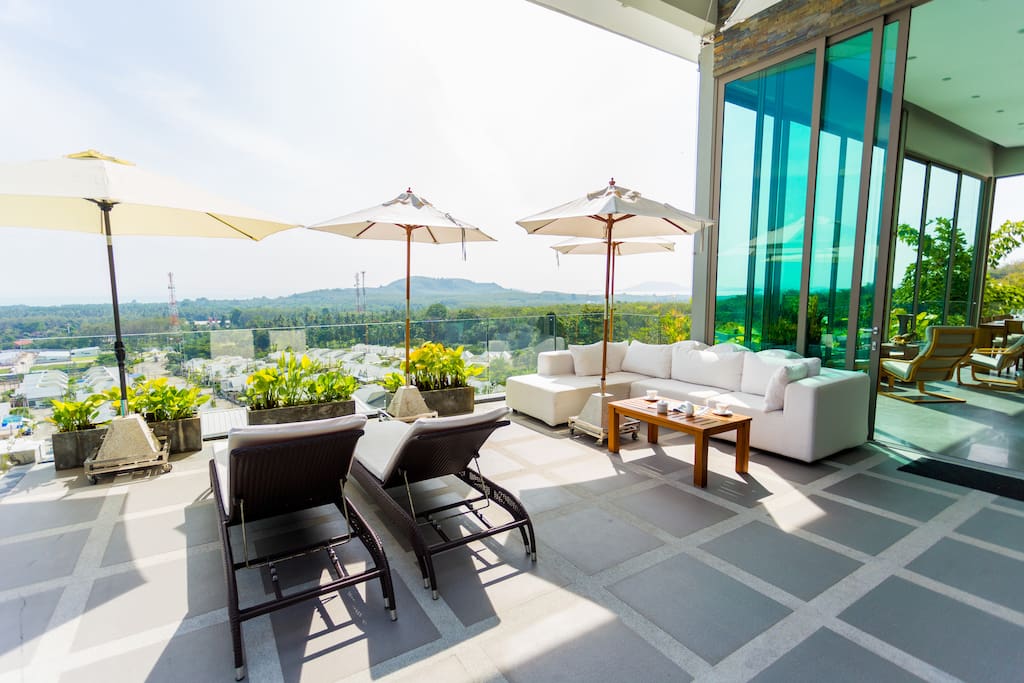 The Sunbrella outdoor sofa is the ideal place to relax
