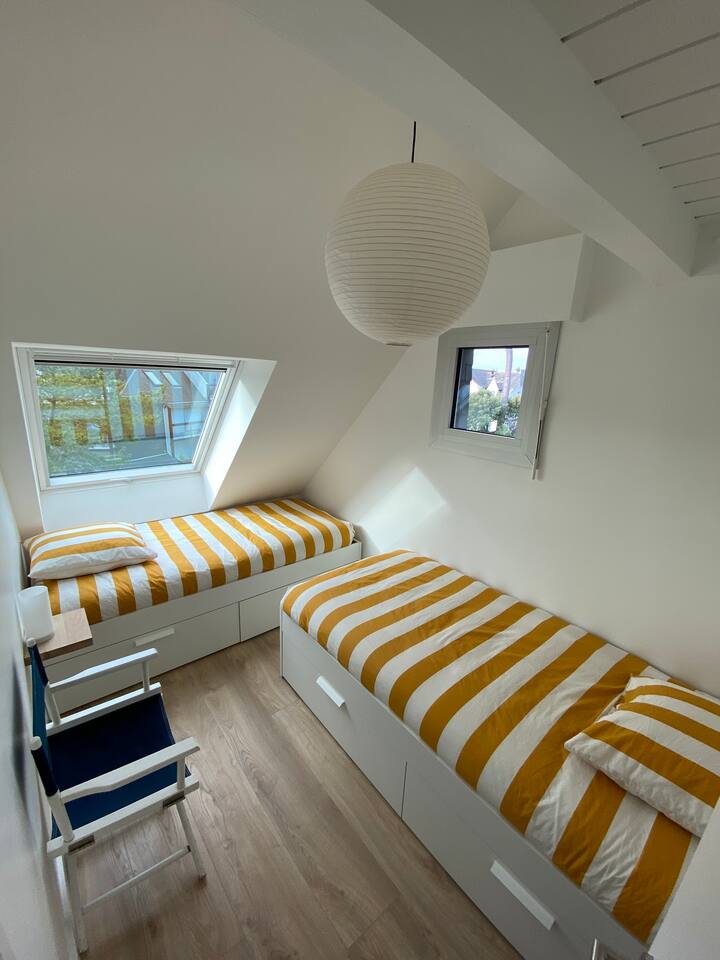 bedrooms single beds on the ground floor, garden view