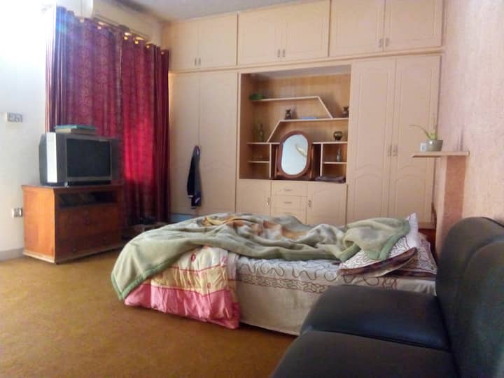 One bed attached kitchen and bathroom