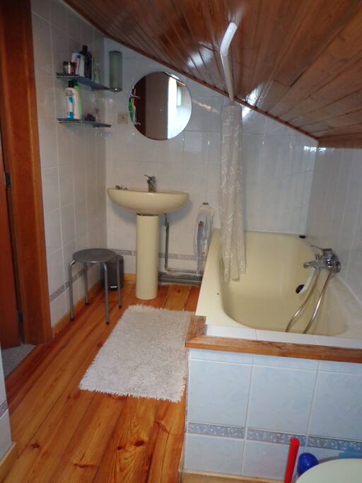 bath room with bath tub, shower and toilet