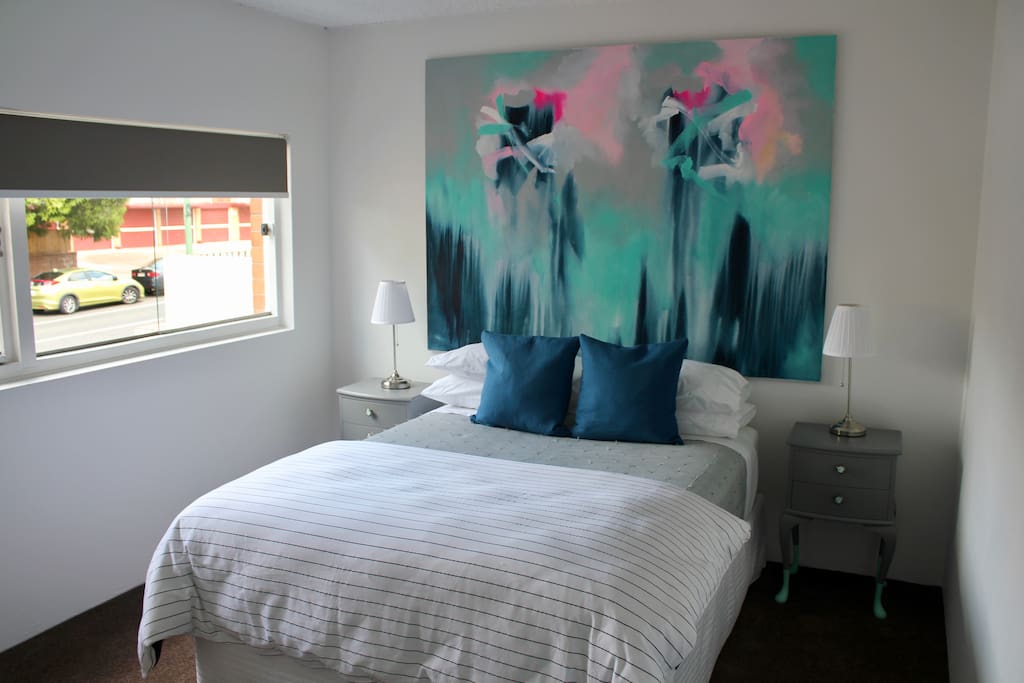 Bedroom 1 with queen bed and A/C