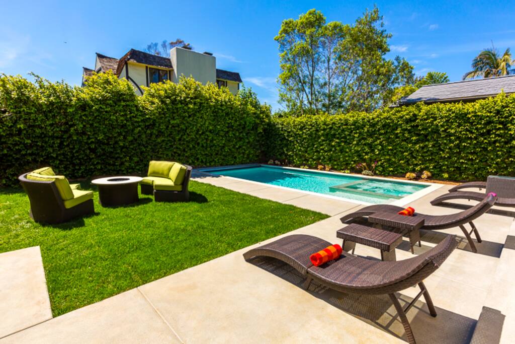 Private, serene Back Yard with new salt water pool and spa and built-in barbecue.