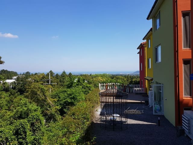 Jeju Swiss village ('211', '201') with 'comma'