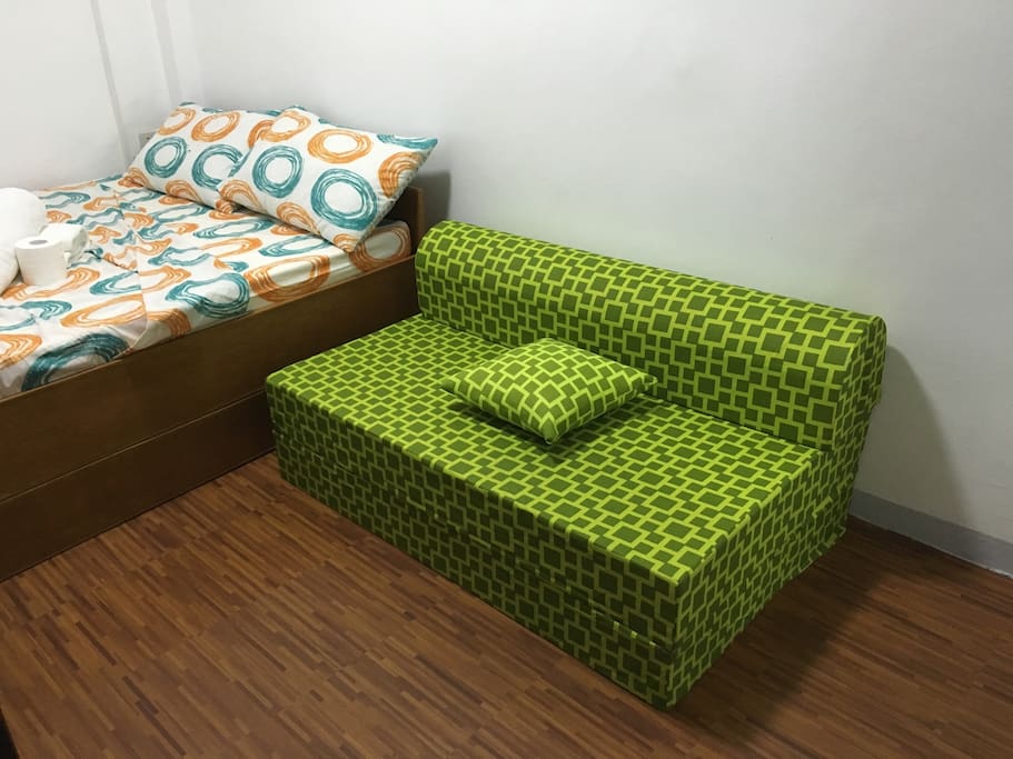 Sofa in green room (folded)