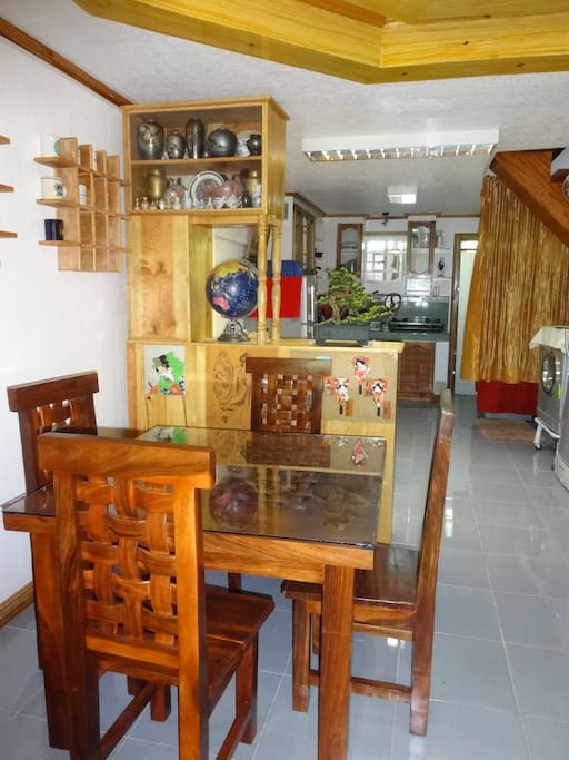 The formal dining room with the kitchen