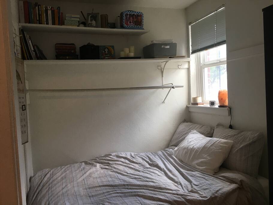 I put my bed in the walk-in closet for maximum space/privacy. I'll eventually put but a curtain. Full size bed, super comfy! Turn on the Himalayan Salt Lamp if you're feeling saucy :)