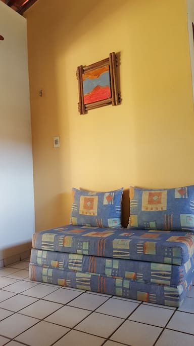 sala com sofá cama
