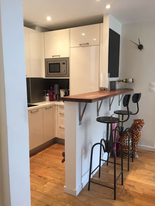 Kitchen with a bar