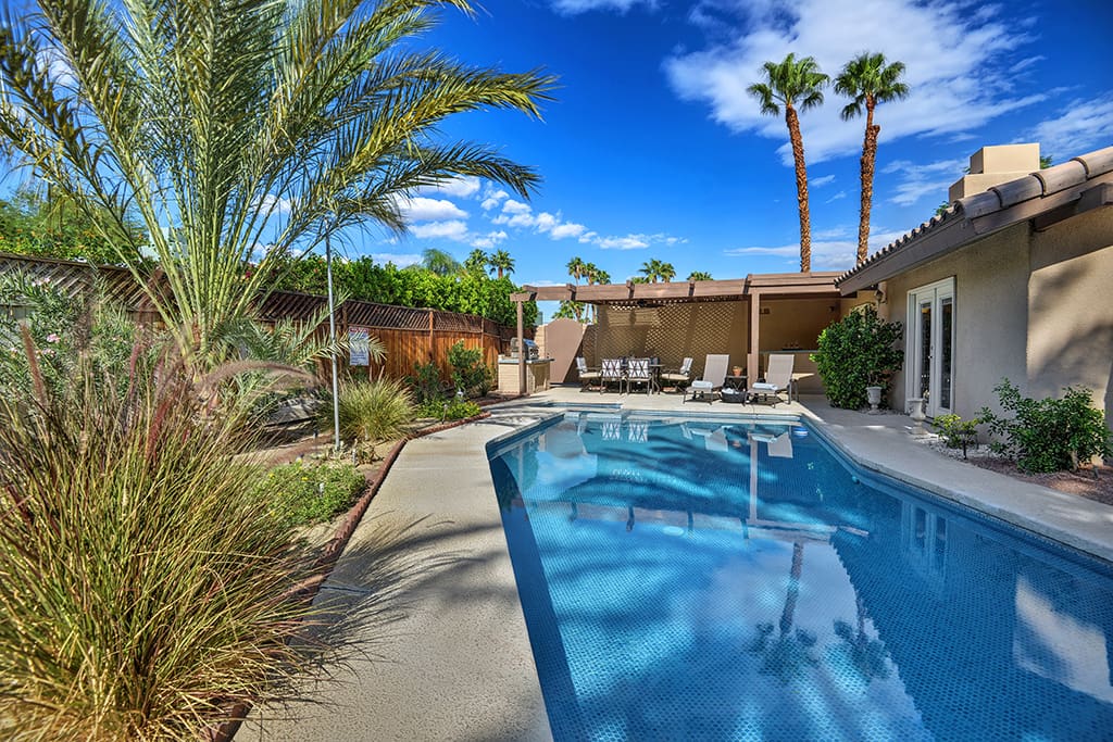 POOL AND SPA TO BACK OF HOUSE NESTLED - PADUA PARADISE - PALM SPRINGS VACATION RENTAL POOL HOME