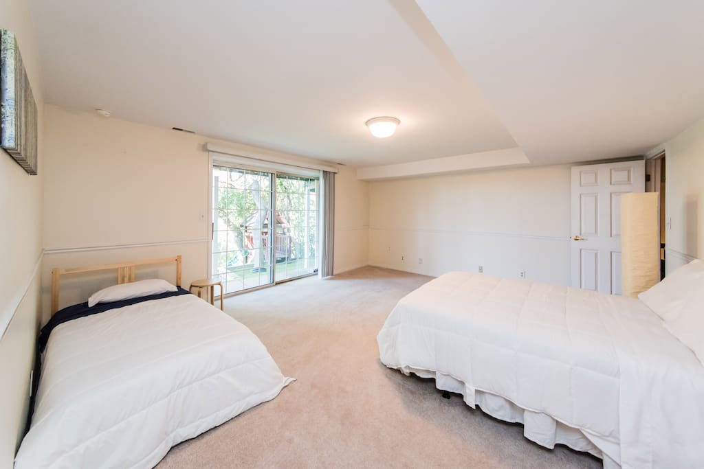 Bedroom with great views, one full and one twin bed. extra twin mattress in closet, bedding provided.