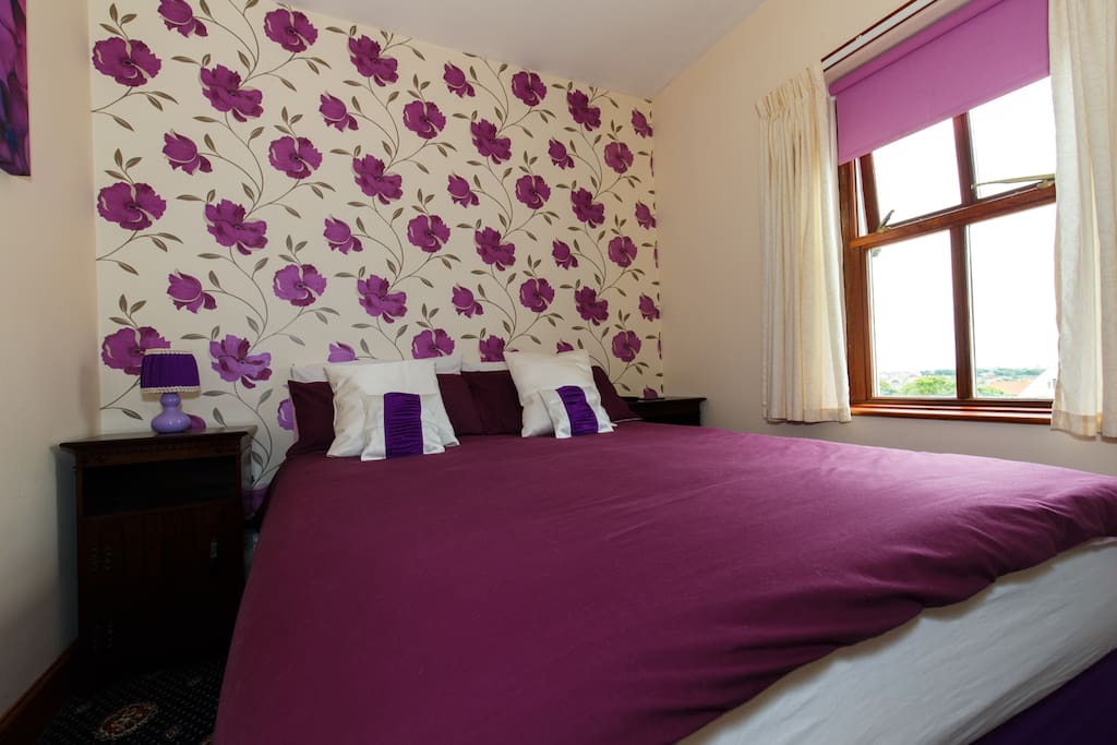 Small comfortable room with large double bed, TV/DVD and tea and coffee making facilities