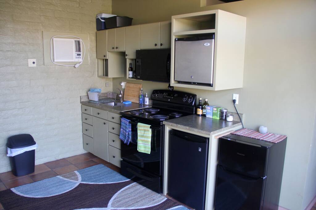 Kitchen for DIY food preparation and amazing view with private patio right off the kitchen.