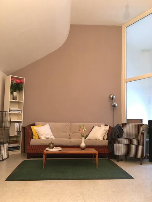 living room. sofa is perfectly comfy for a single person sleeping (slatted frame and feather filled mattress)